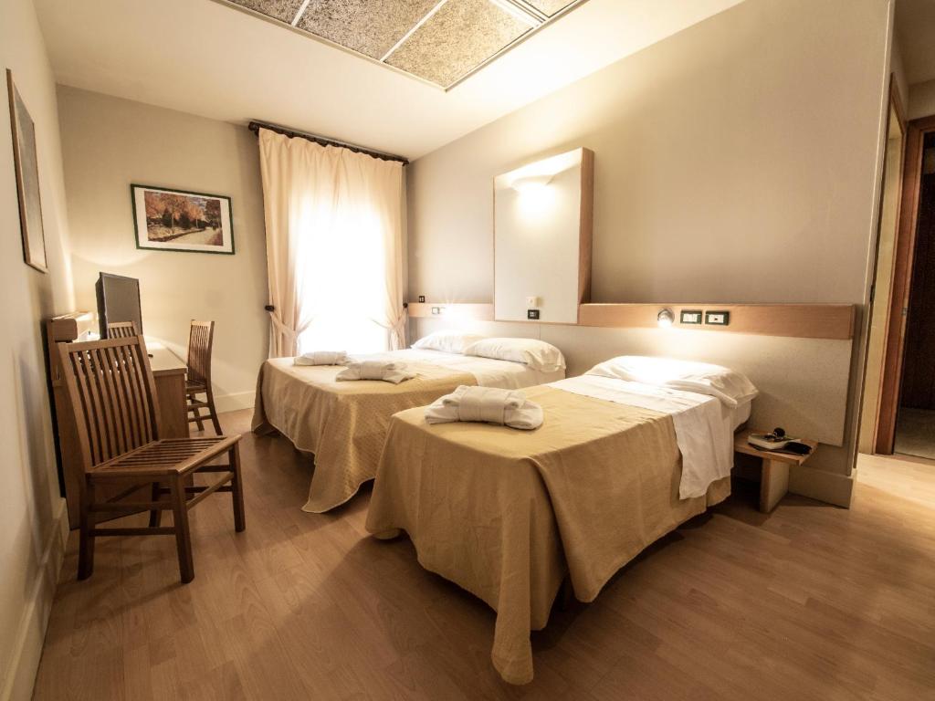 Postel nebo postele na pokoji v ubytování Duca Del Mare - Hotel Di Nardo group