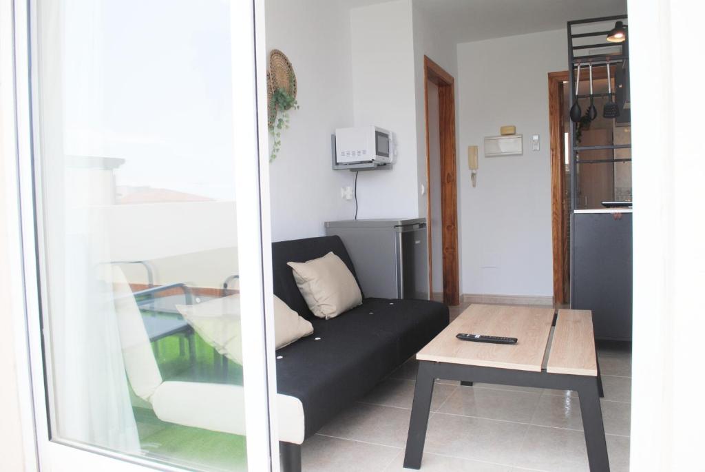 Posedenie v ubytovaní Apartamentos Vicenta Playa Carihuela