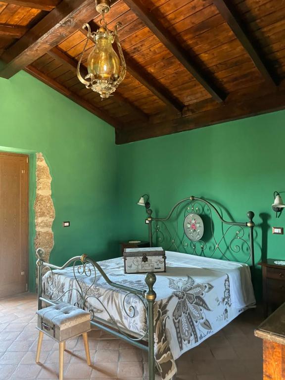 Postel nebo postele na pokoji v ubytování Agriturismo Le Faeta