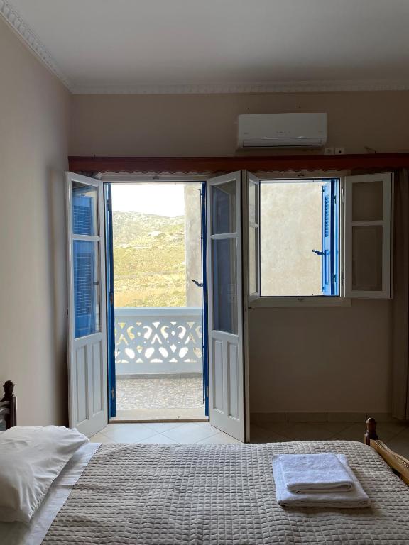 Postel nebo postele na pokoji v ubytování Hotel THE OLIVE TREE