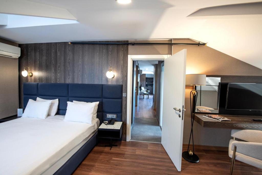 Postel nebo postele na pokoji v ubytování Hotel Bosfora