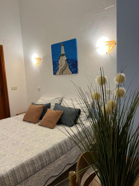 Postel nebo postele na pokoji v ubytování apartmani Natali