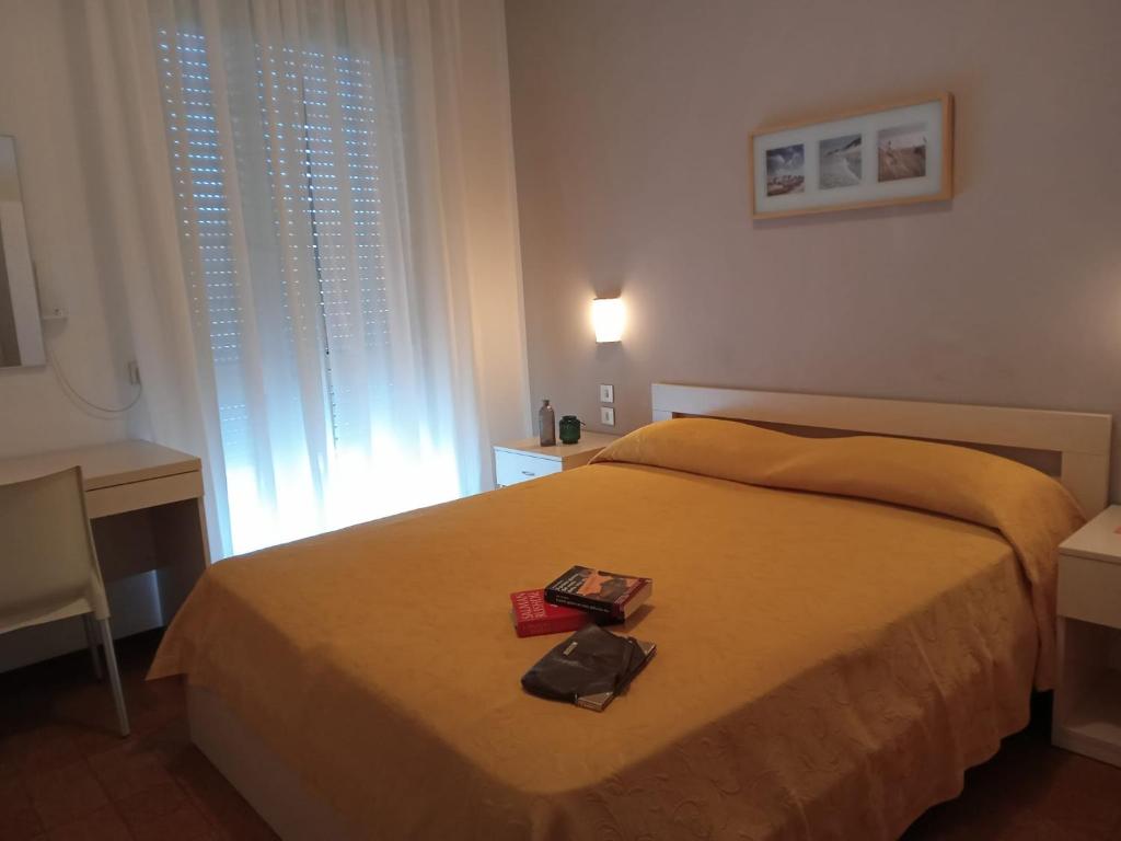 Postel nebo postele na pokoji v ubytování Hotel Haiti