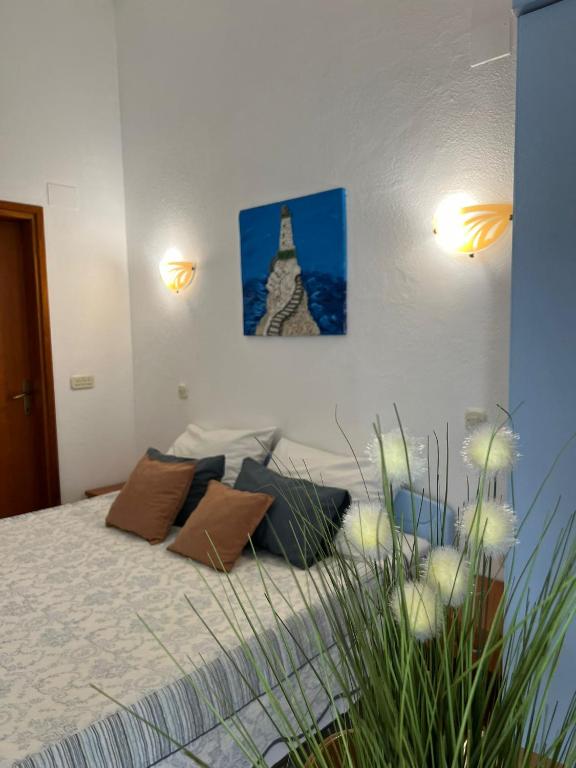 Postel nebo postele na pokoji v ubytování apartmani Natali