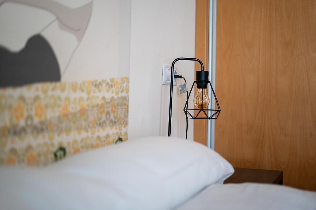 Postel nebo postele na pokoji v ubytování Espléndido piso en el centro