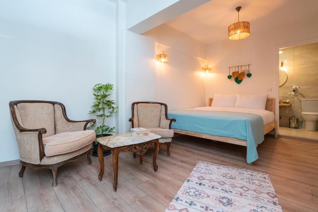 Postel nebo postele na pokoji v ubytování Aya Butik Otel