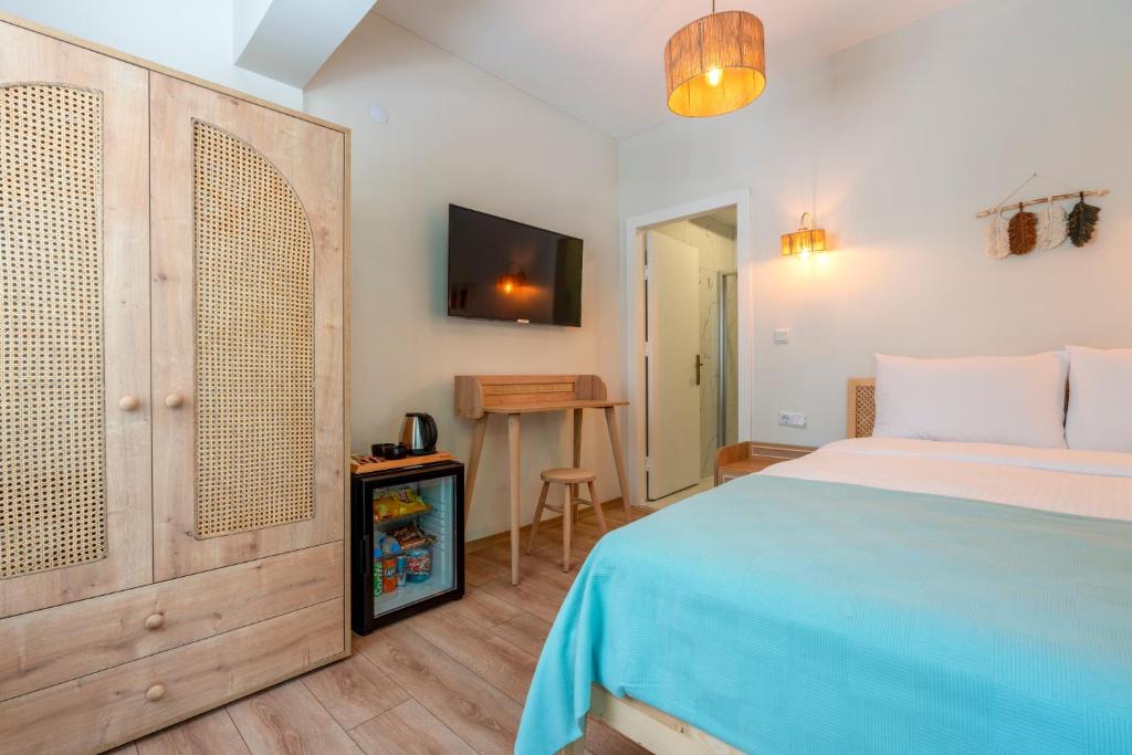 Postel nebo postele na pokoji v ubytování Aya Butik Otel