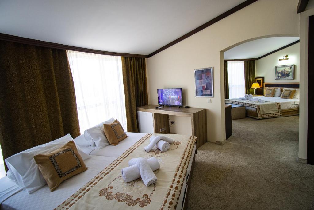 Postel nebo postele na pokoji v ubytování RK MAGİC DREAM HOTEL