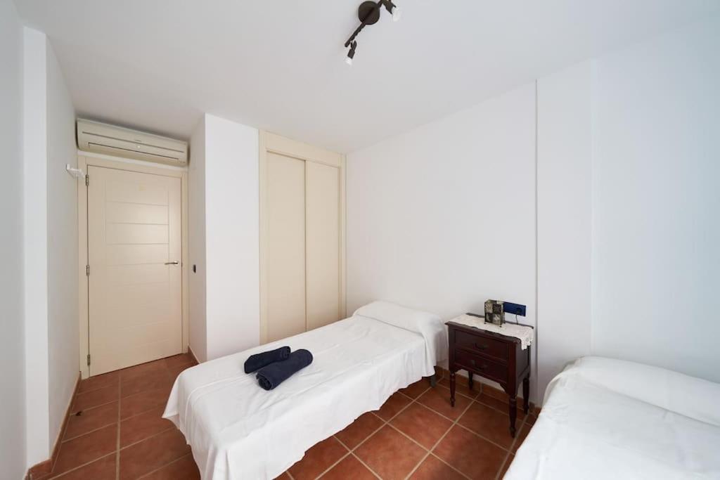 Posteľ alebo postele v izbe v ubytovaní Apartamento Diego