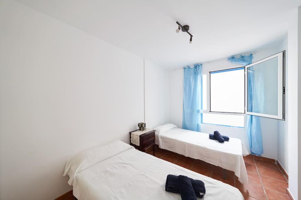 Posteľ alebo postele v izbe v ubytovaní Apartamento Diego