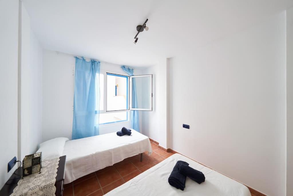 Posteľ alebo postele v izbe v ubytovaní Apartamento Diego