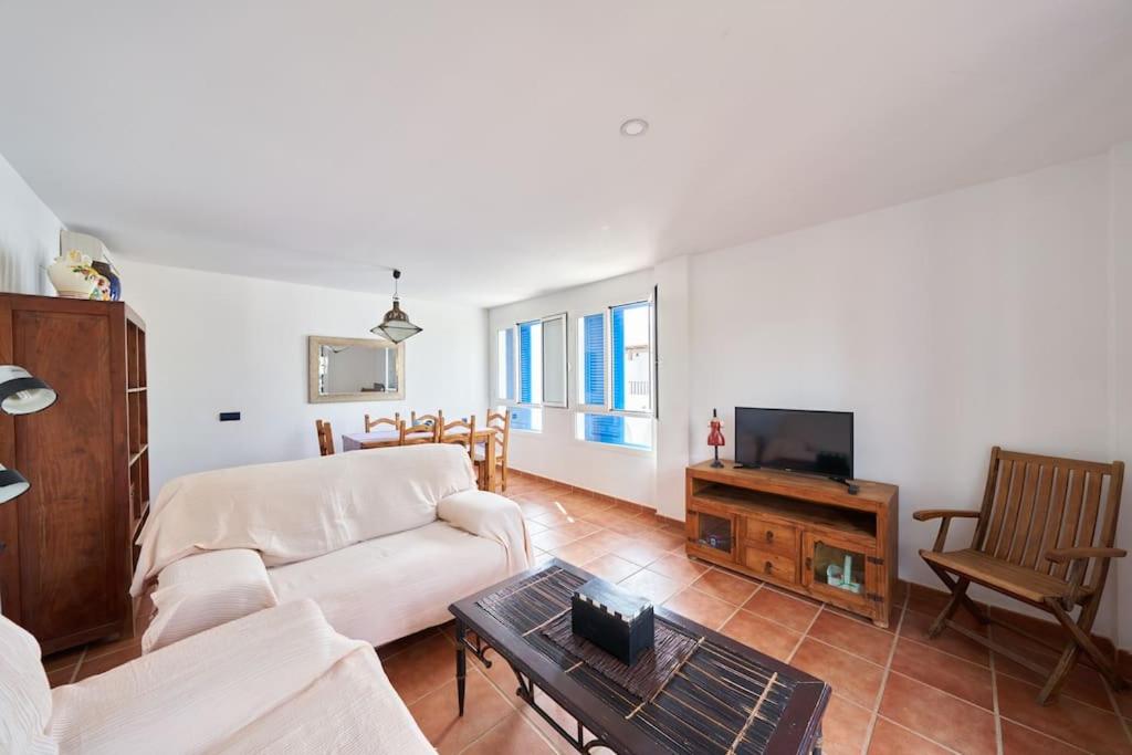 Televízia a/alebo spoločenská miestnosť v ubytovaní Apartamento Diego