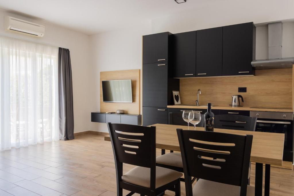 Kuchyň nebo kuchyňský kout v ubytování Apartments & rooms Stella Adriatica