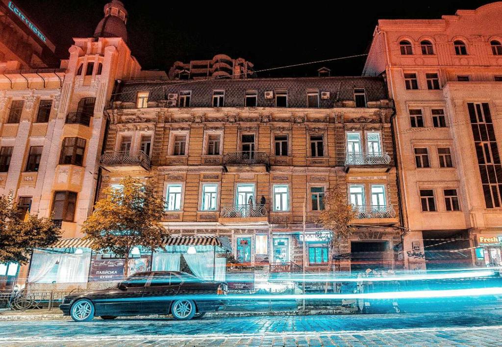 a car parked in front of a building at Kyiv Art Apartments near Golden Gate in Kyiv