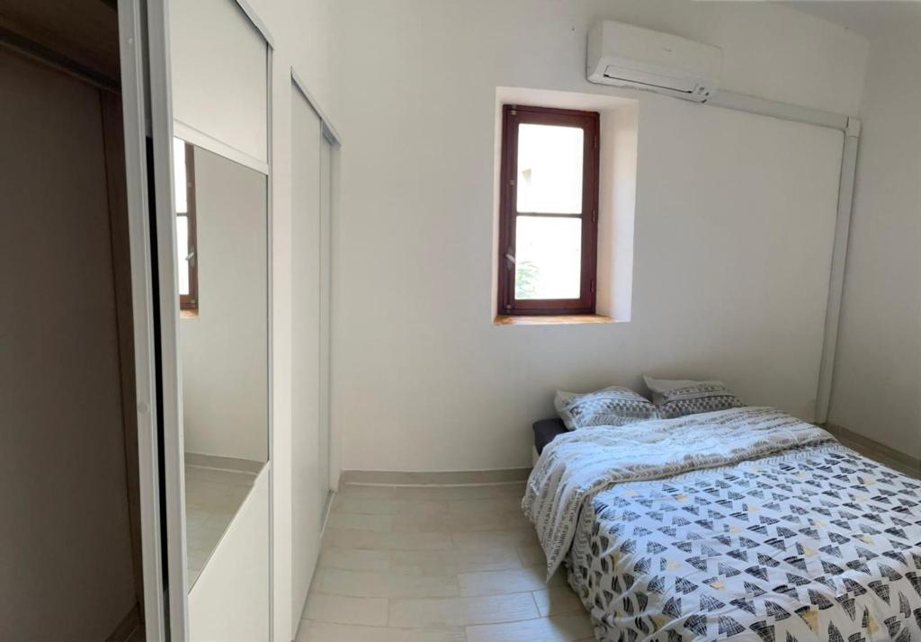 Posteľ alebo postele v izbe v ubytovaní T2 Aix centre climatisé
