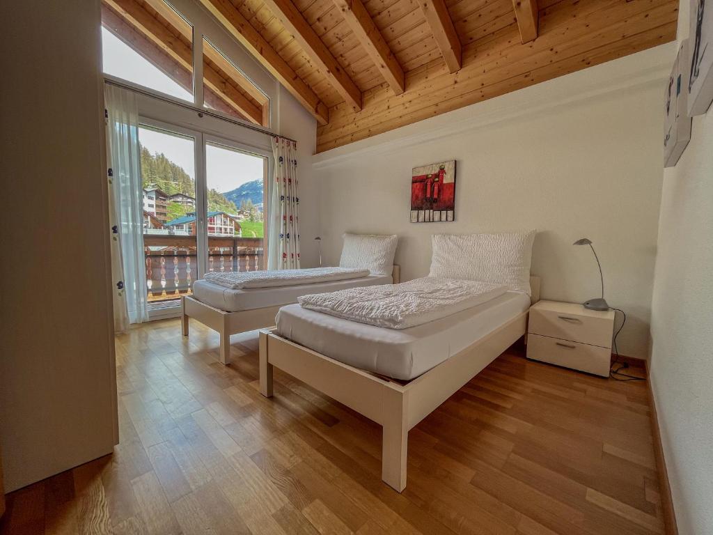 Postel nebo postele na pokoji v ubytování Residence Chateau