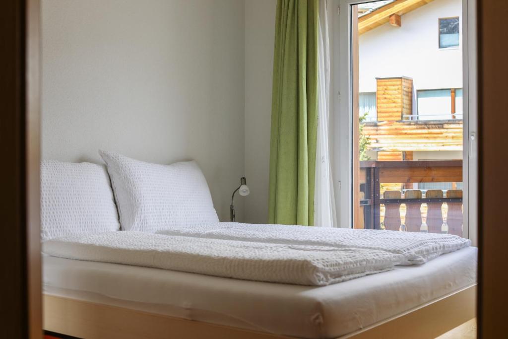 Postel nebo postele na pokoji v ubytování Residence Chateau