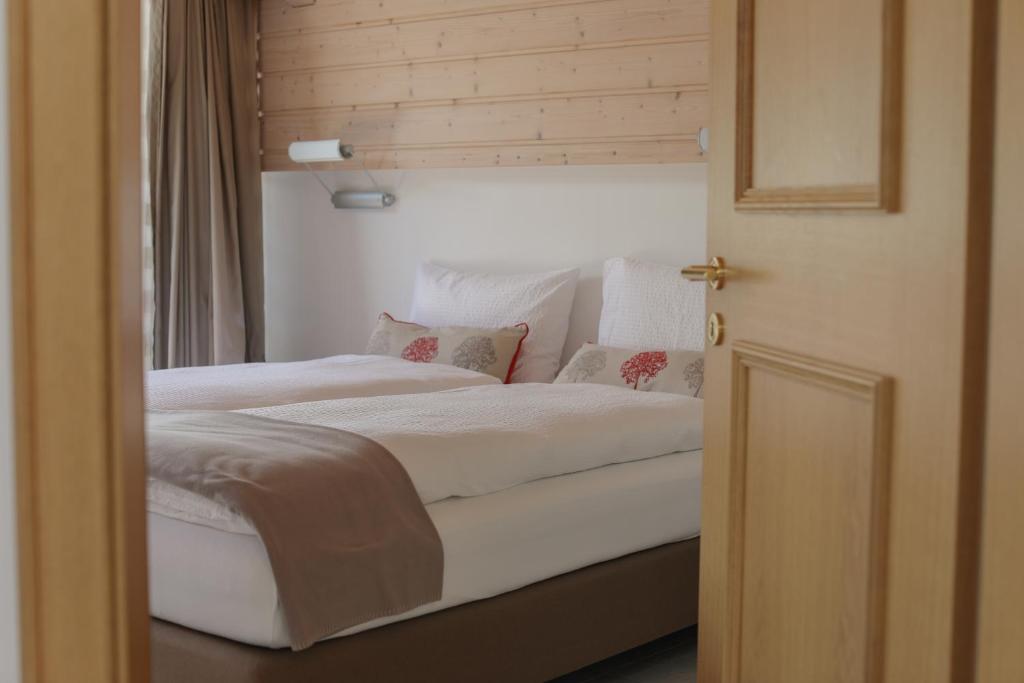Postel nebo postele na pokoji v ubytování Residence Chateau