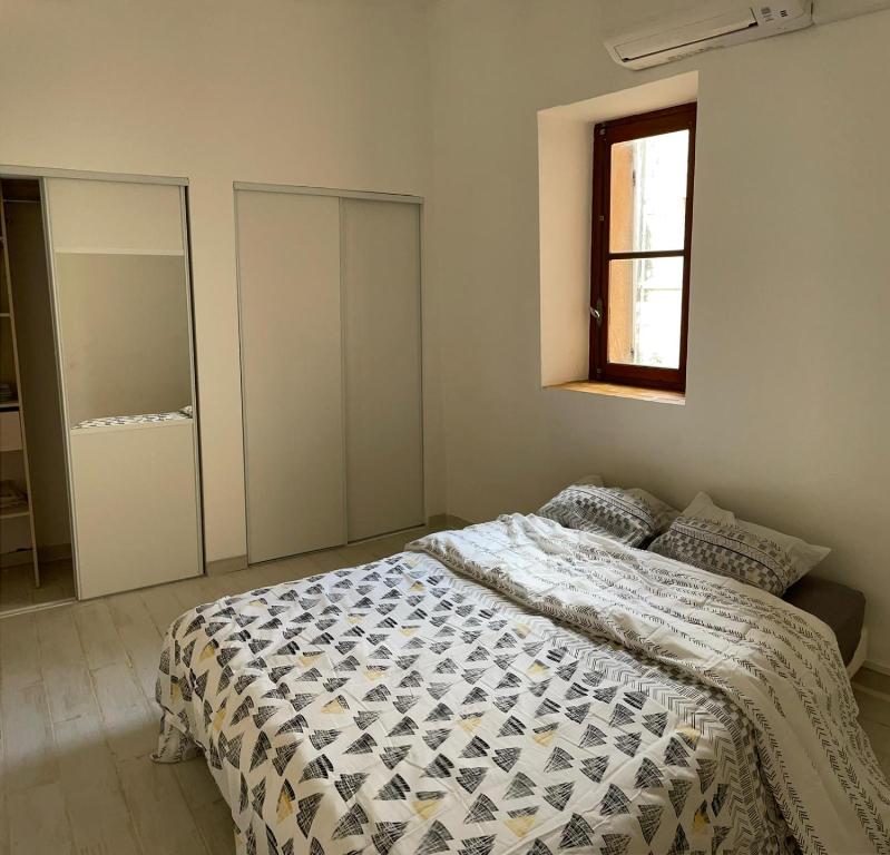 Posteľ alebo postele v izbe v ubytovaní T2 Aix centre climatisé
