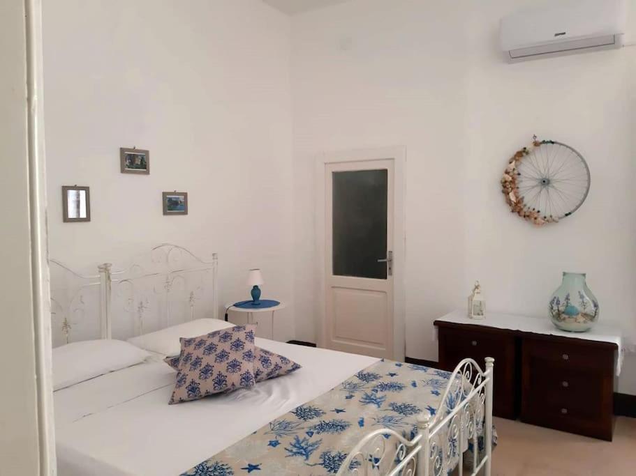 Postel nebo postele na pokoji v ubytování Carulli, Salento e Relax.