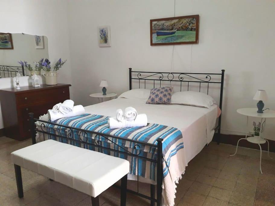 Postel nebo postele na pokoji v ubytování Carulli, Salento e Relax.