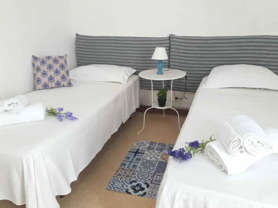 Postel nebo postele na pokoji v ubytování Carulli, Salento e Relax.
