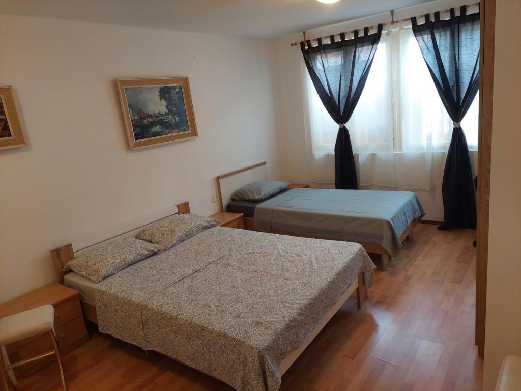 Postel nebo postele na pokoji v ubytování IN Kala