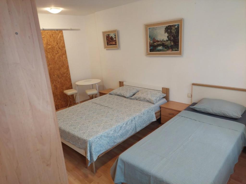 Postel nebo postele na pokoji v ubytování IN Kala