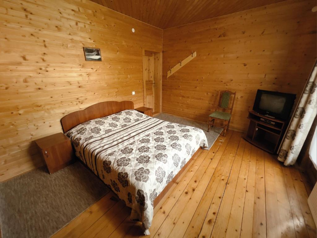Postel nebo postele na pokoji v ubytování Darynka