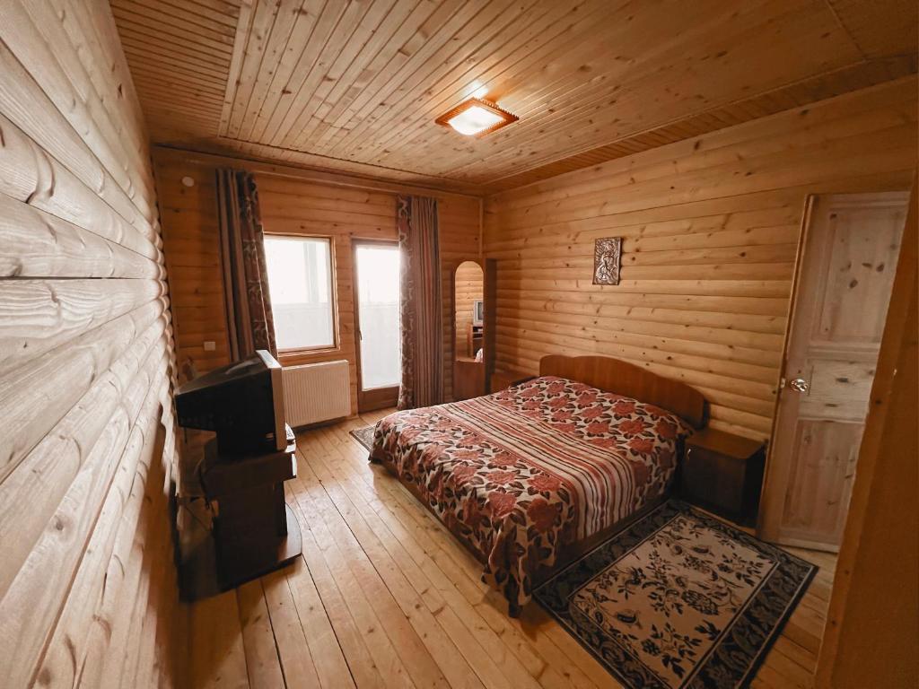 Postel nebo postele na pokoji v ubytování Darynka