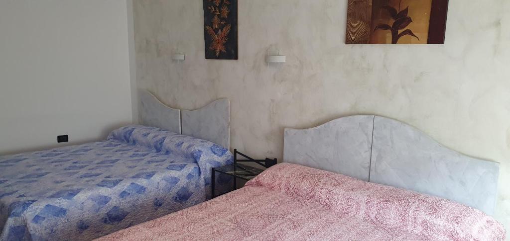 Una cama o camas en una habitación de Le Rustiche Foresteria