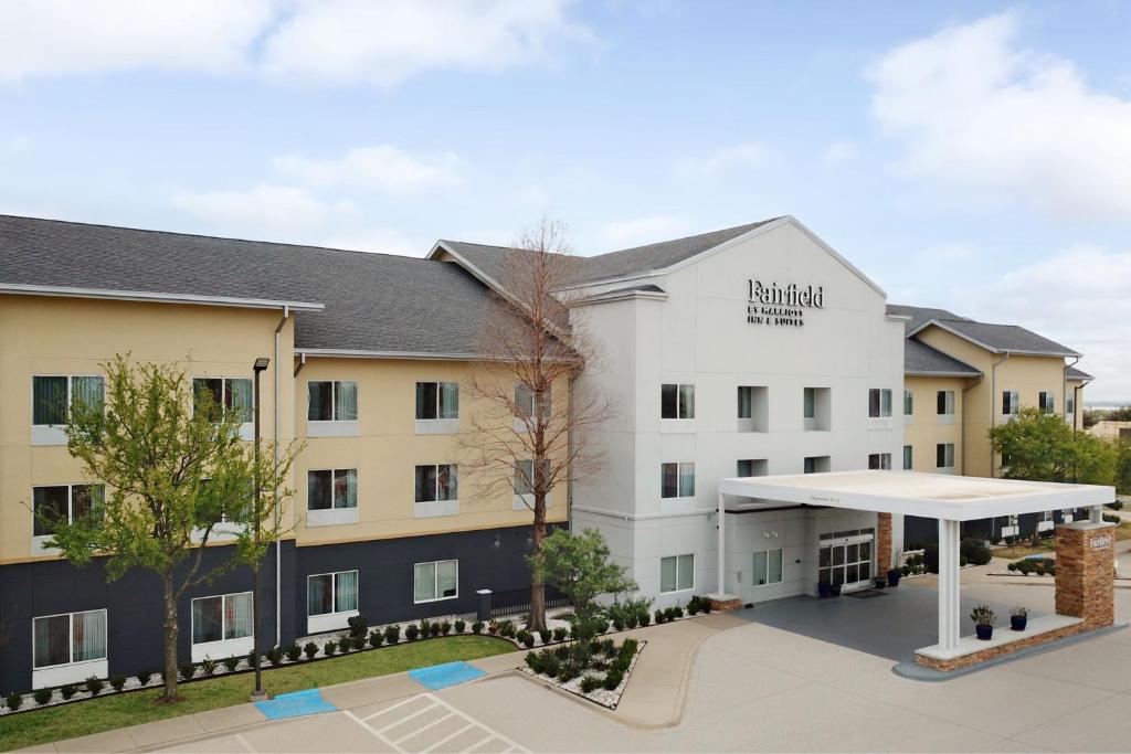 a rendering of the front of a hotel at Fairfield Inn & Suites Denton in Denton
