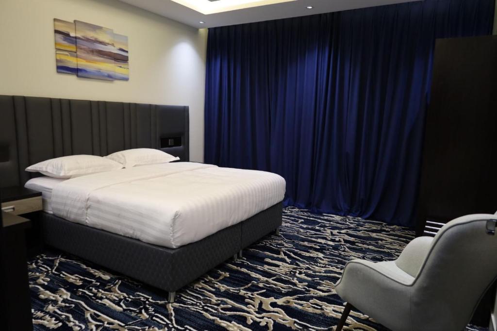 Postel nebo postele na pokoji v ubytování فندق قمم بارك Qimam Park Hotel 6