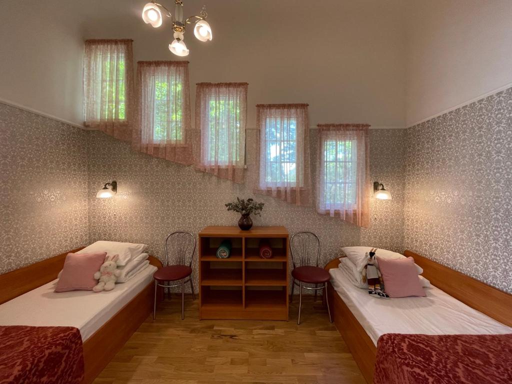 Postel nebo postele na pokoji v ubytování Green Villa