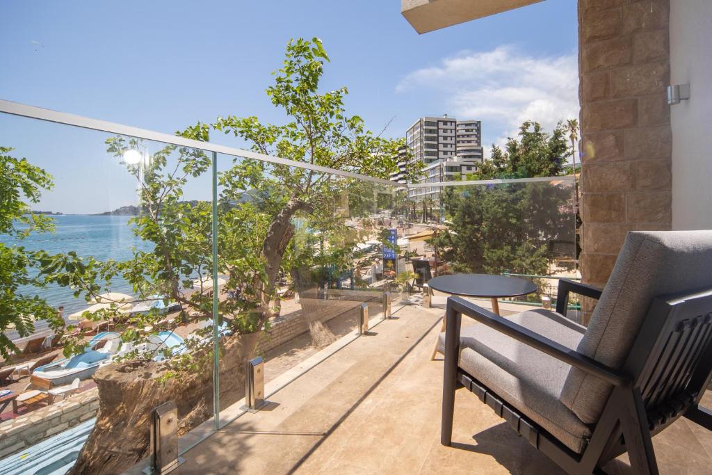 a balcony with a view of the water at Boutique Hotel Shell in Budva
