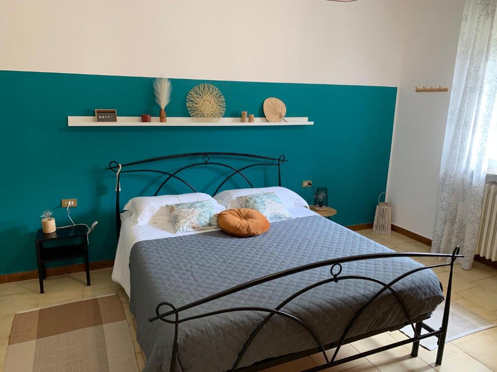Postel nebo postele na pokoji v ubytování IULI LAKE HOME Tra lago e montagna