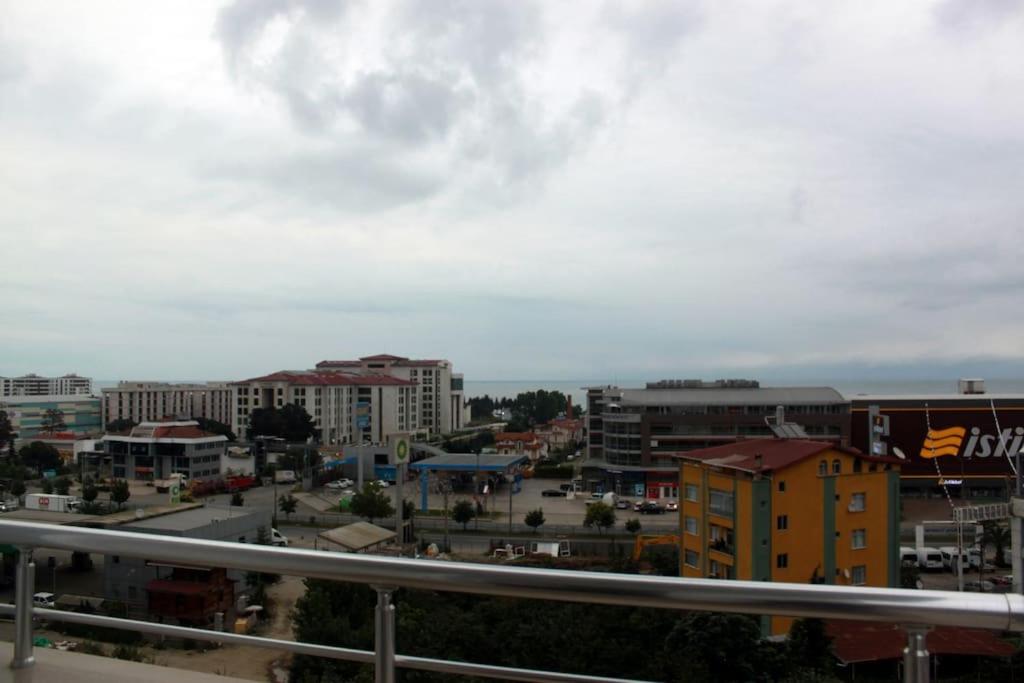a view of a city with buildings and a highway at Star apartments in Trabzon
