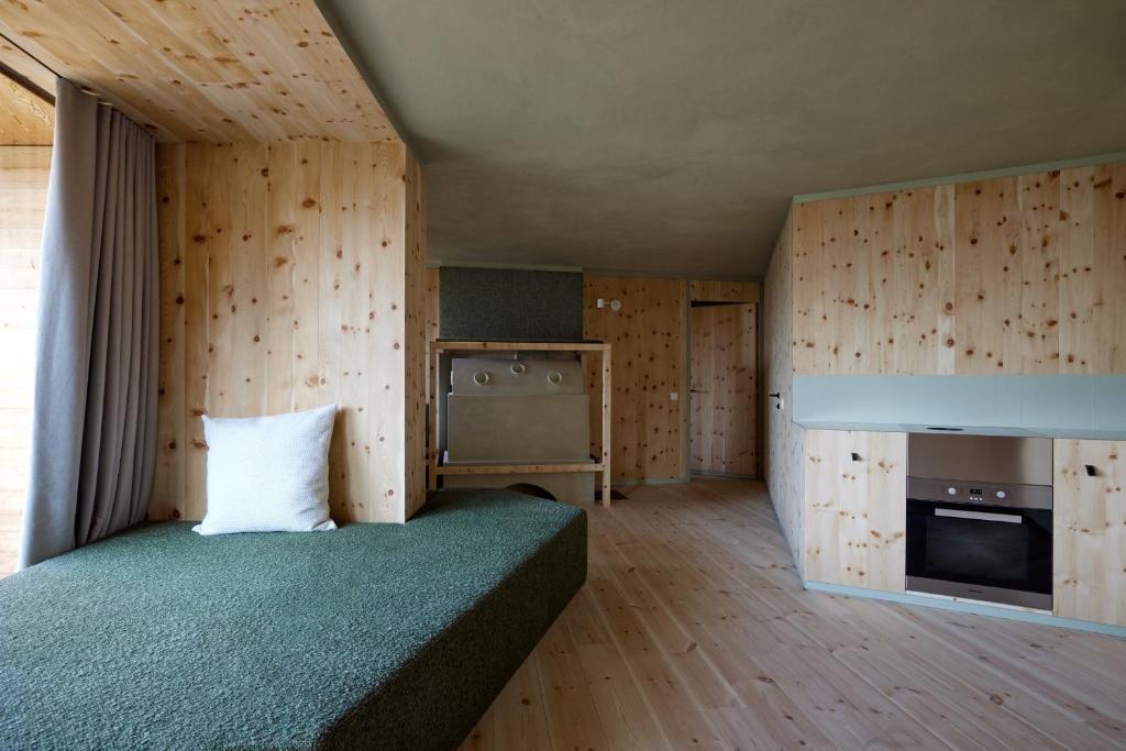 A bed or beds in a room at Odles Lodge