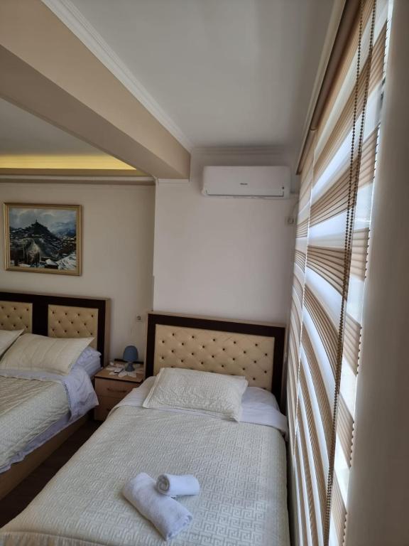 Postel nebo postele na pokoji v ubytování Double17 Apartaments