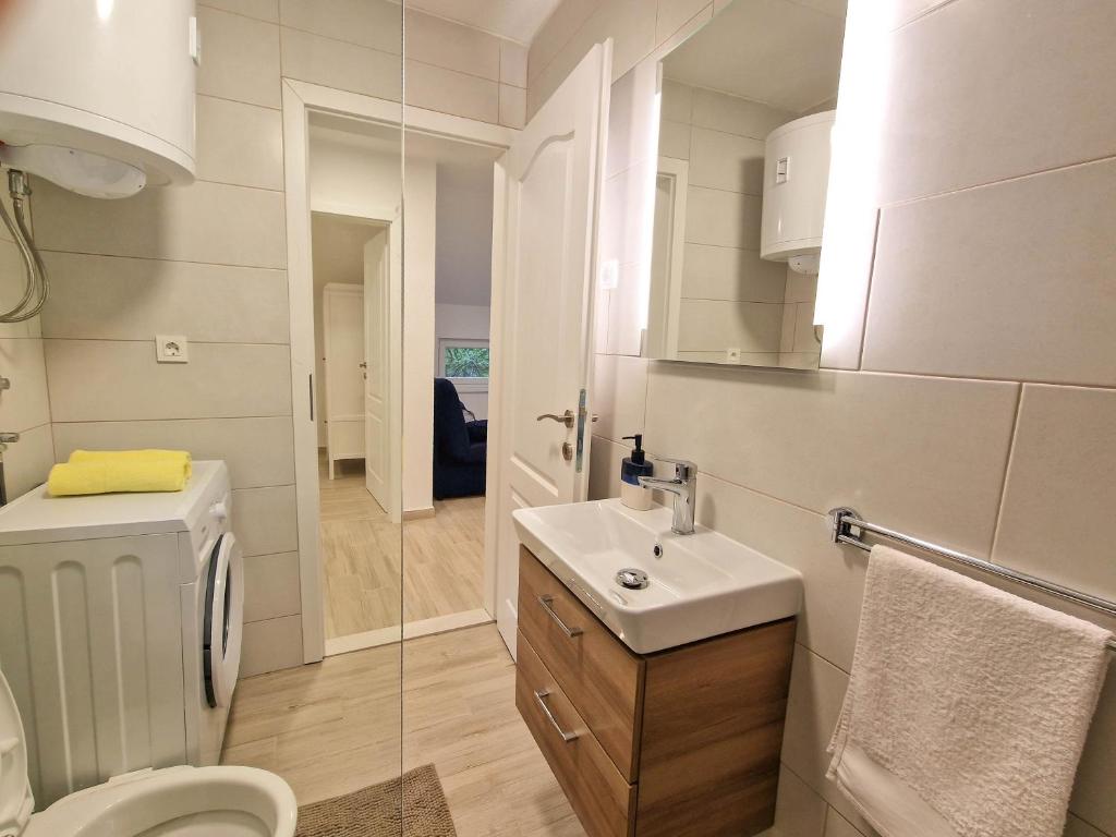 Koupelna v ubytování Apartments Rudelinka