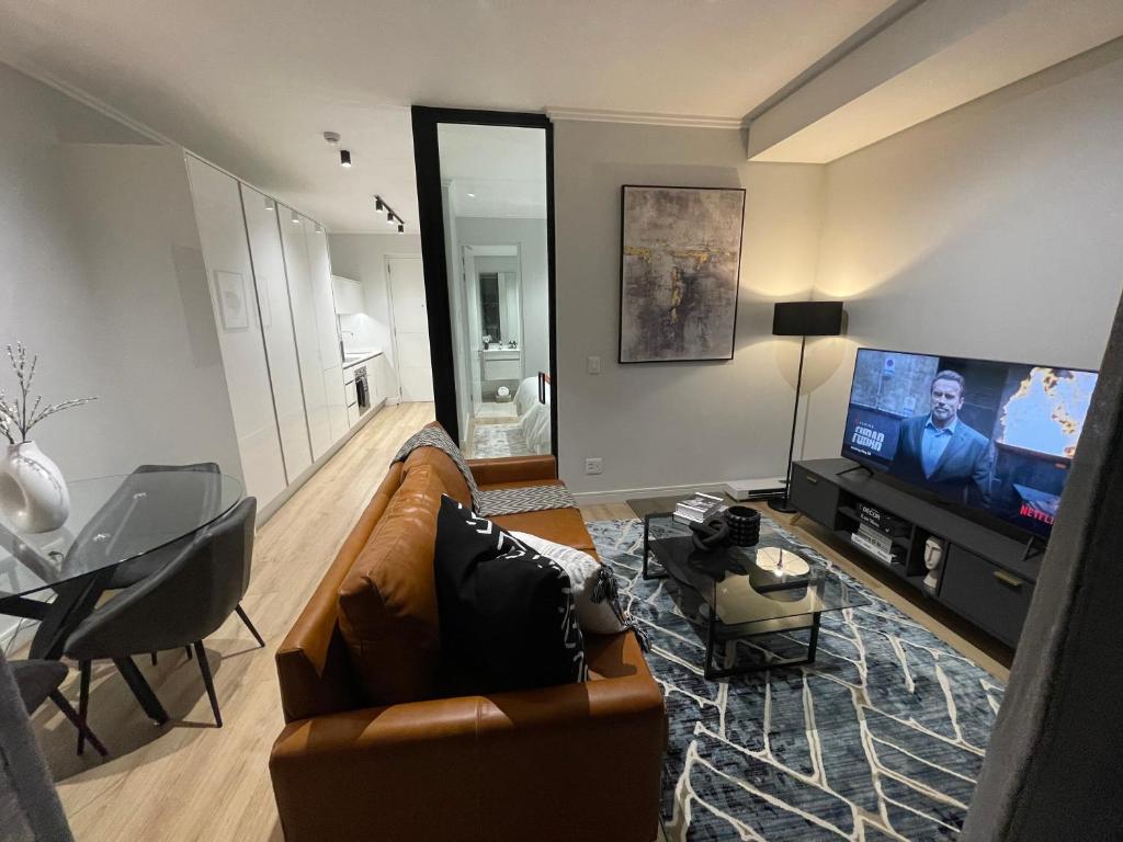 TV a/nebo společenská místnost v ubytování Exec Oasis @Ellipse