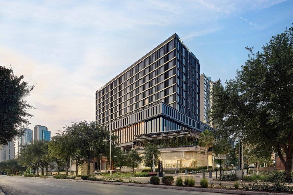 a rendering of a tall building on a city street at JW Marriott Hotel Monterrey Valle in Monterrey