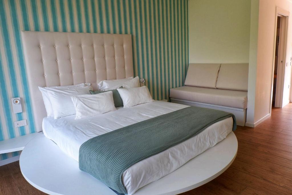 Postel nebo postele na pokoji v ubytování Elle Ecoholiday