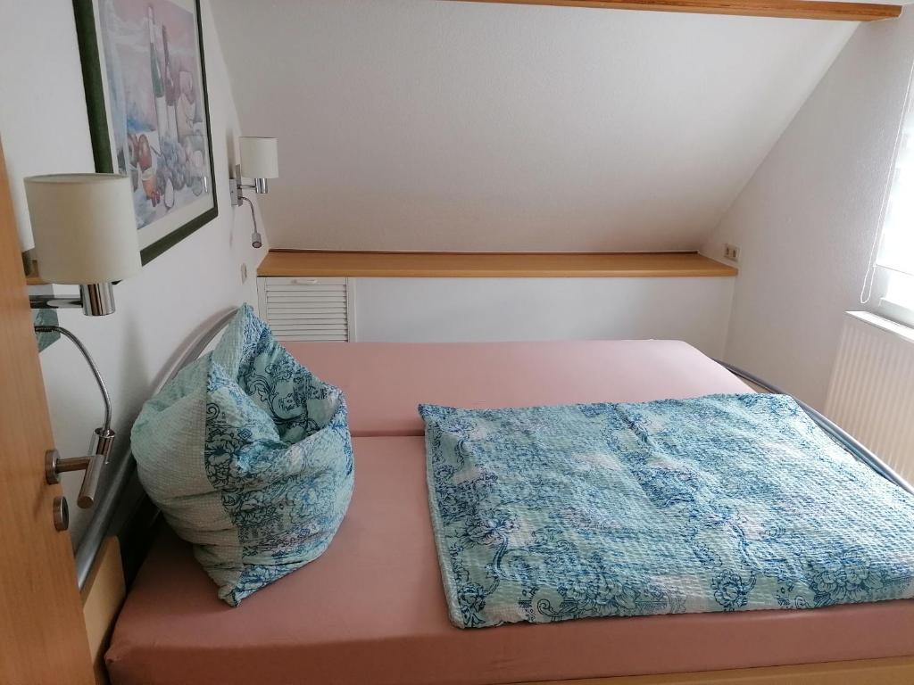Postel nebo postele na pokoji v ubytování Ferienwohnung Max