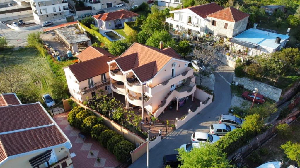 an overhead view of a house with a parking lot at Apartments Vuksanovic in Tivat