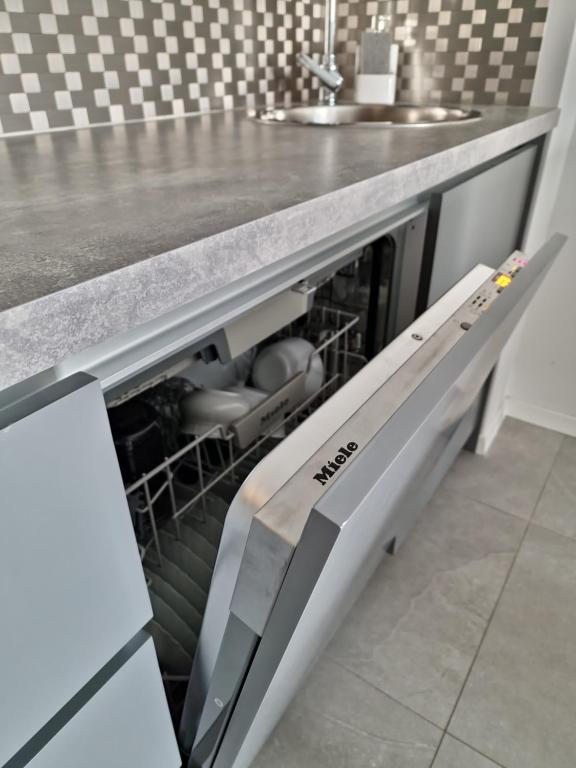 Kuchyňa alebo kuchynka v ubytovaní Apartment Lola