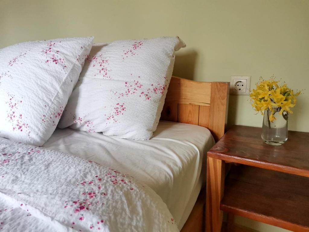 Postel nebo postele na pokoji v ubytování Hotel Lamala