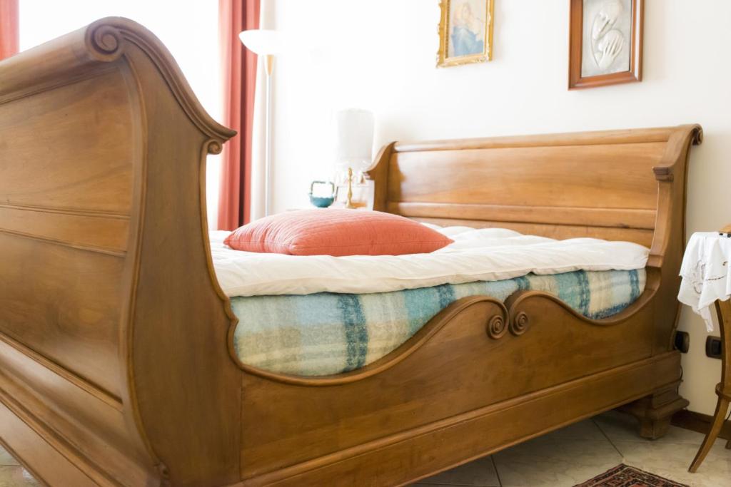 A bed or beds in a room at B&B - Il Portichetto