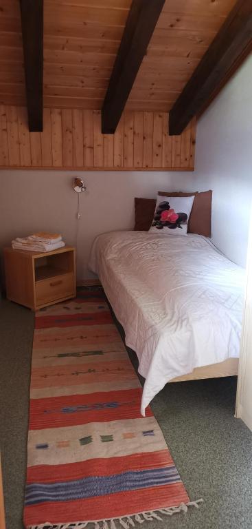Postel nebo postele na pokoji v ubytování B&B Pension Lärch