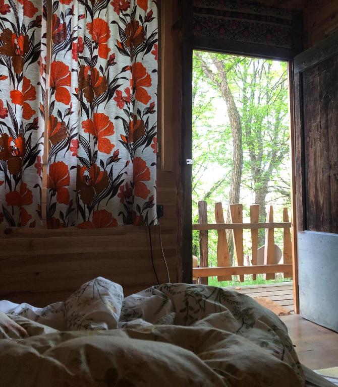 Postel nebo postele na pokoji v ubytování Fenêtre sur les Pyrénées